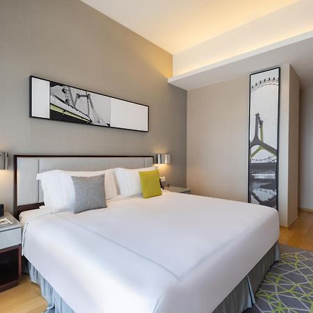 Cm Service Apartment Тяньцзинь Экстерьер фото