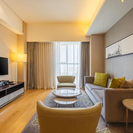 Cm Service Apartment Тяньцзинь Экстерьер фото