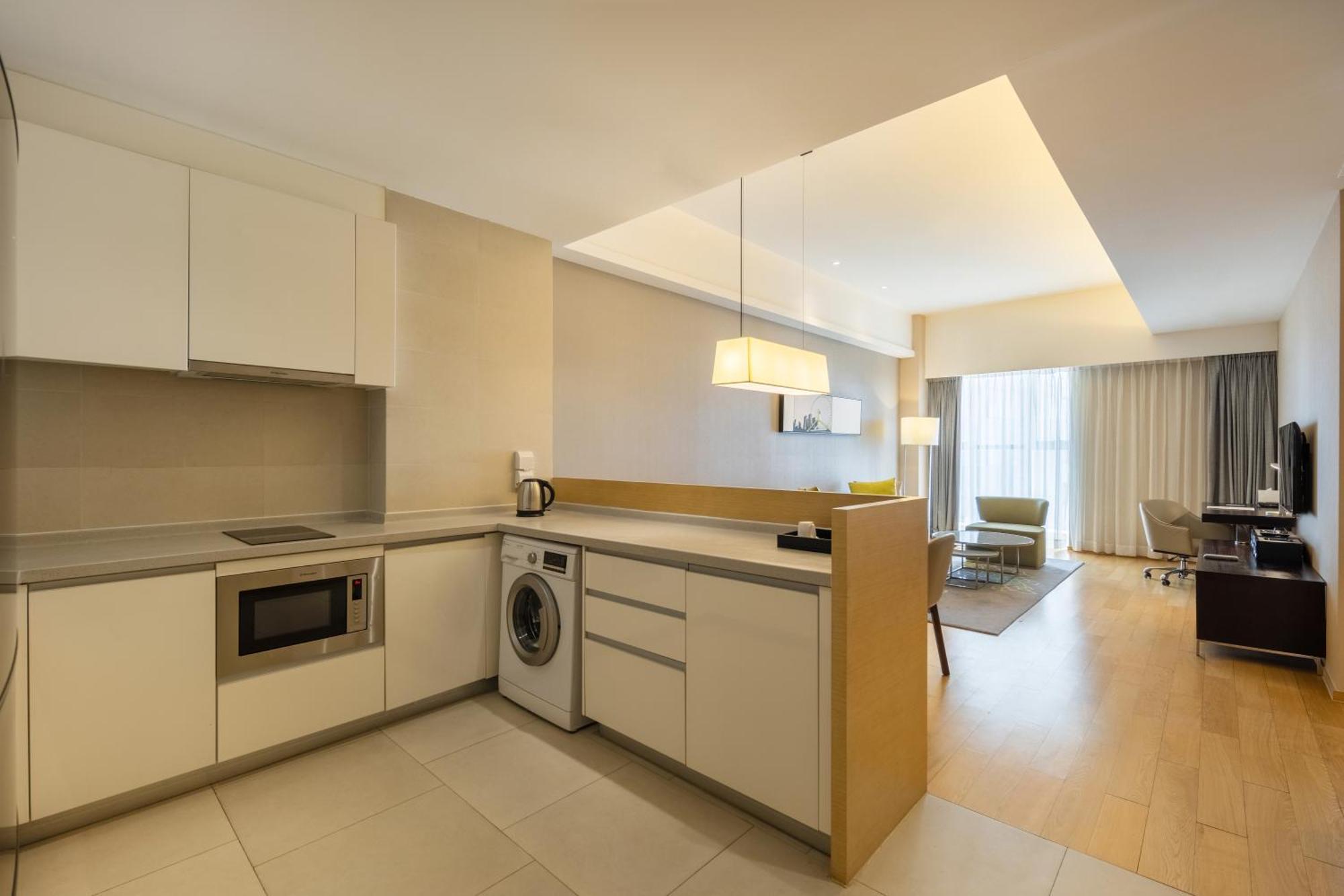 Cm Service Apartment Тяньцзинь Экстерьер фото