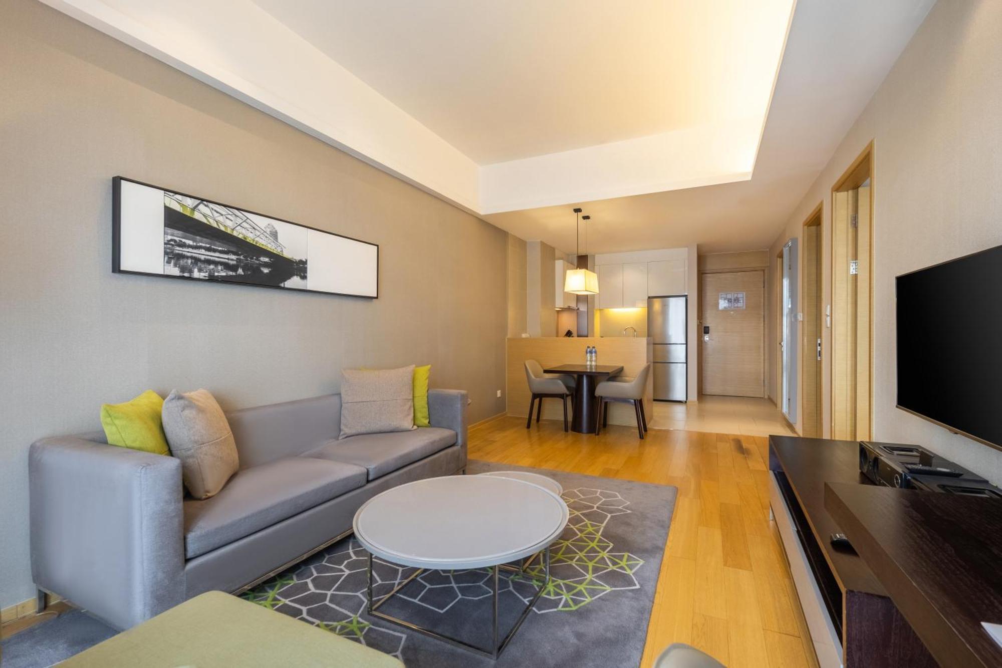 Cm Service Apartment Тяньцзинь Экстерьер фото